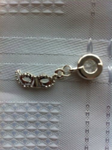 Divine Beads: Silver plated masquerade ball mask dangle charm. Will fit Pandora, Biagi, Tedora, Chamilia, Bacio, Troll and other European style charms & beads bracelets. All orders from Divine Beads receive a free gift as a thank you